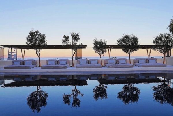 Pool at sunset at Bellonias Villas Hotel Santorini.