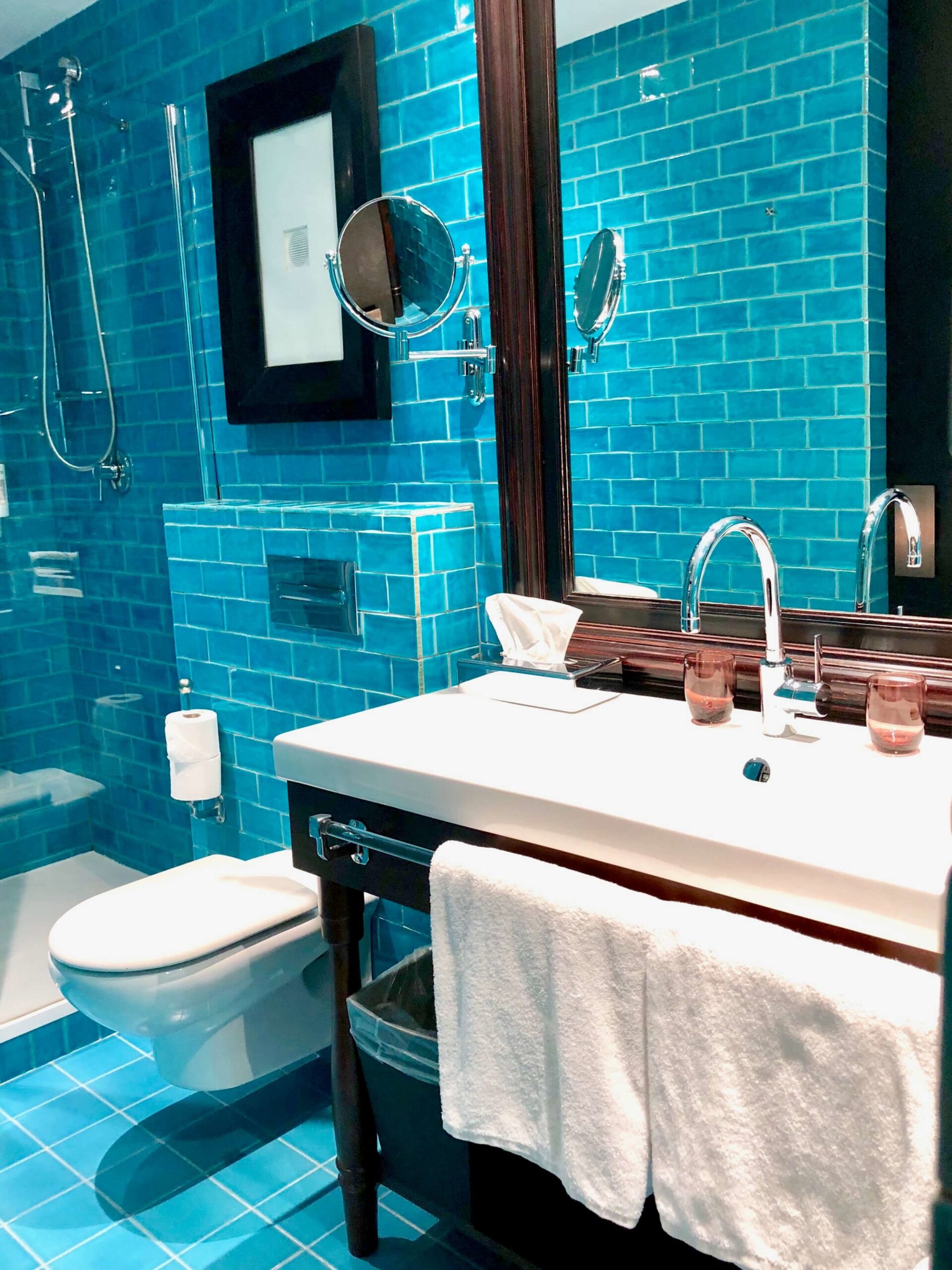 Bathroom with tiles in aqua. 