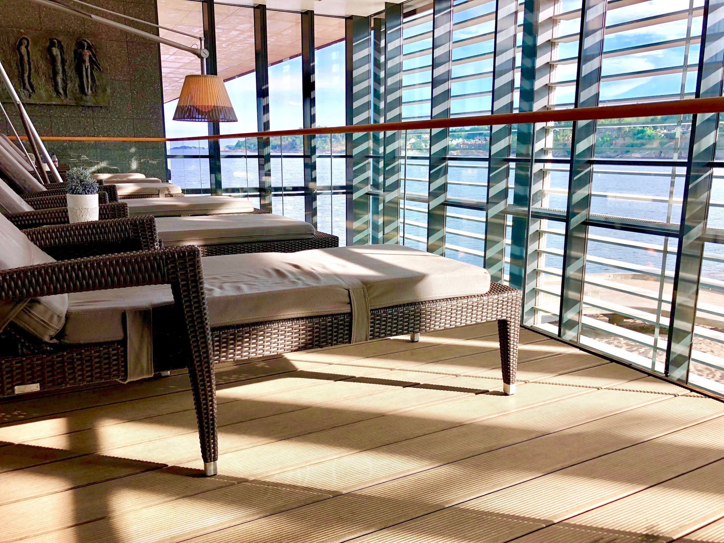 Lounge chairs with a view of the sea at the hotel in Larvik.