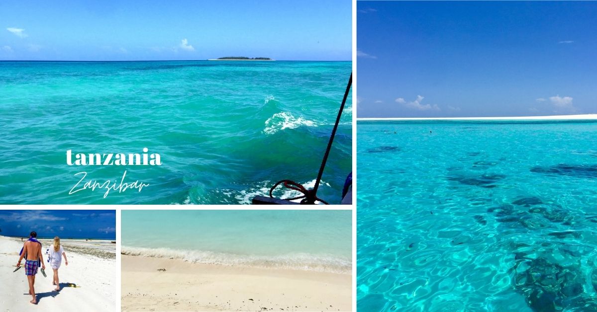 Ungt par vandrer bortover en strand, turkist hav og paradisstrender Zanzibar.