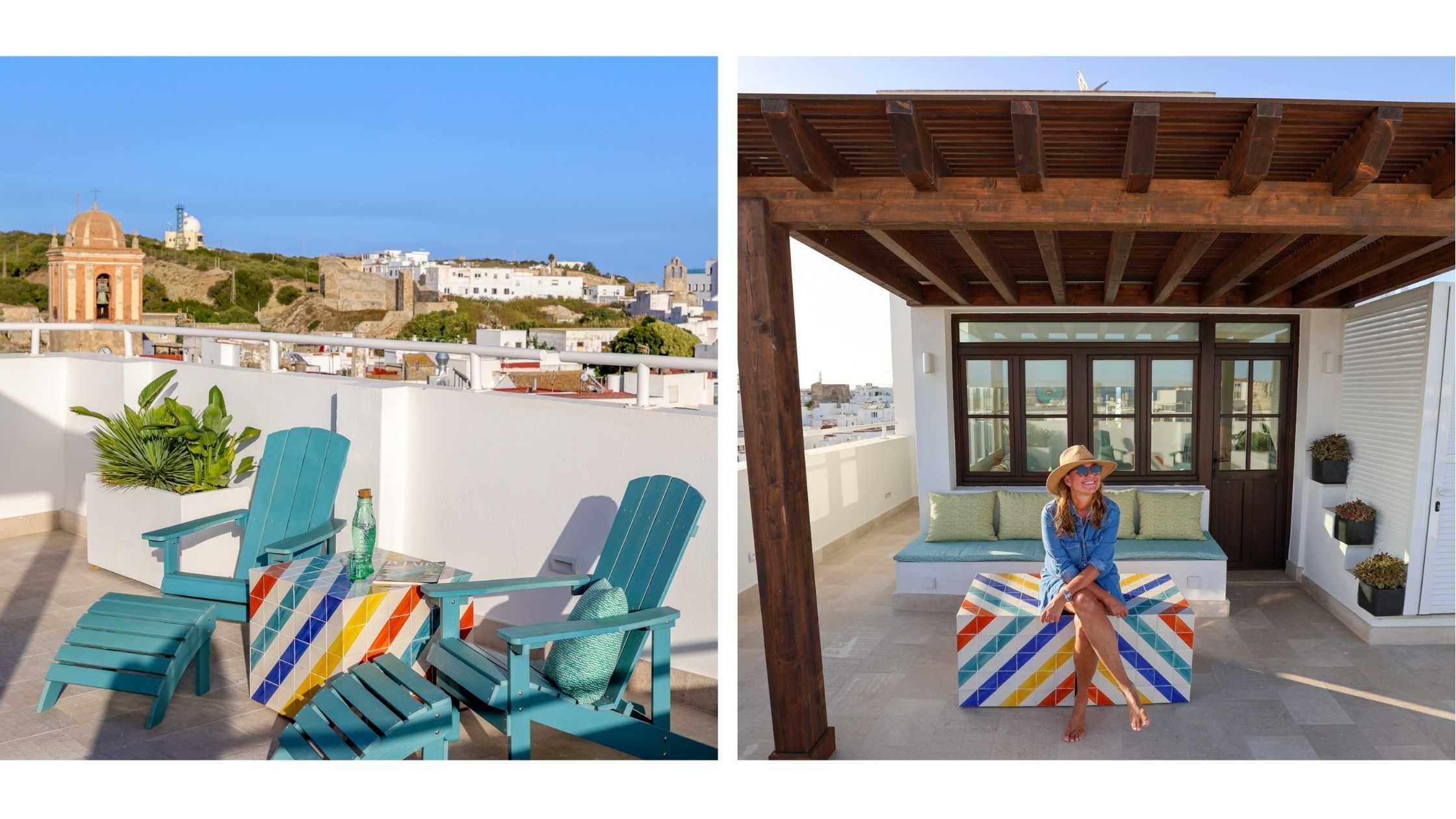 Rooftop terrasse med møbler i glade, sterke farger og utsikt over havet og gamlebyen i Tarifa. 