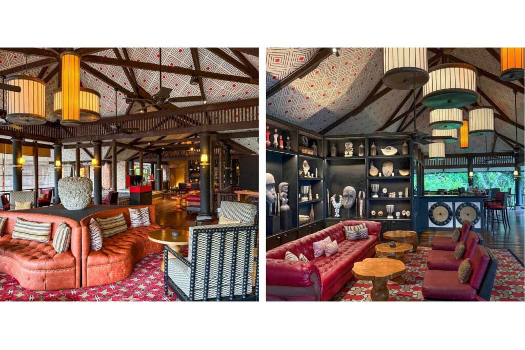Afrikansk stil med mørkt tre og dype, varmen farger i bar og sitteområde på hotellet.
